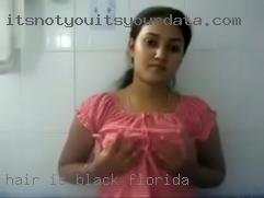 Hair Florida is black and chest length.