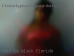 Hair Florida is black and chest length.